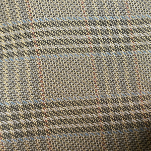 Close-up of a textured fabric with a checkered pattern